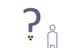Fragezeichen mit Radioaktivitätssymbol, das als Punkt dient, und Mensch (Symbolbild)
