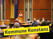 Bild von Besucher*innen des Landratsamtes Konstanz, mit der Überschrift "Kommune Konstanz"